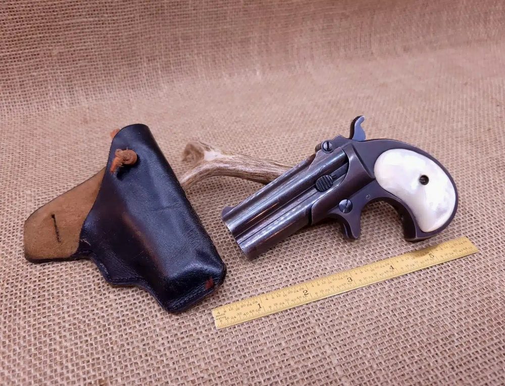 Derringer Classic 22LR Rimfire Pistol with White Pearl Grips